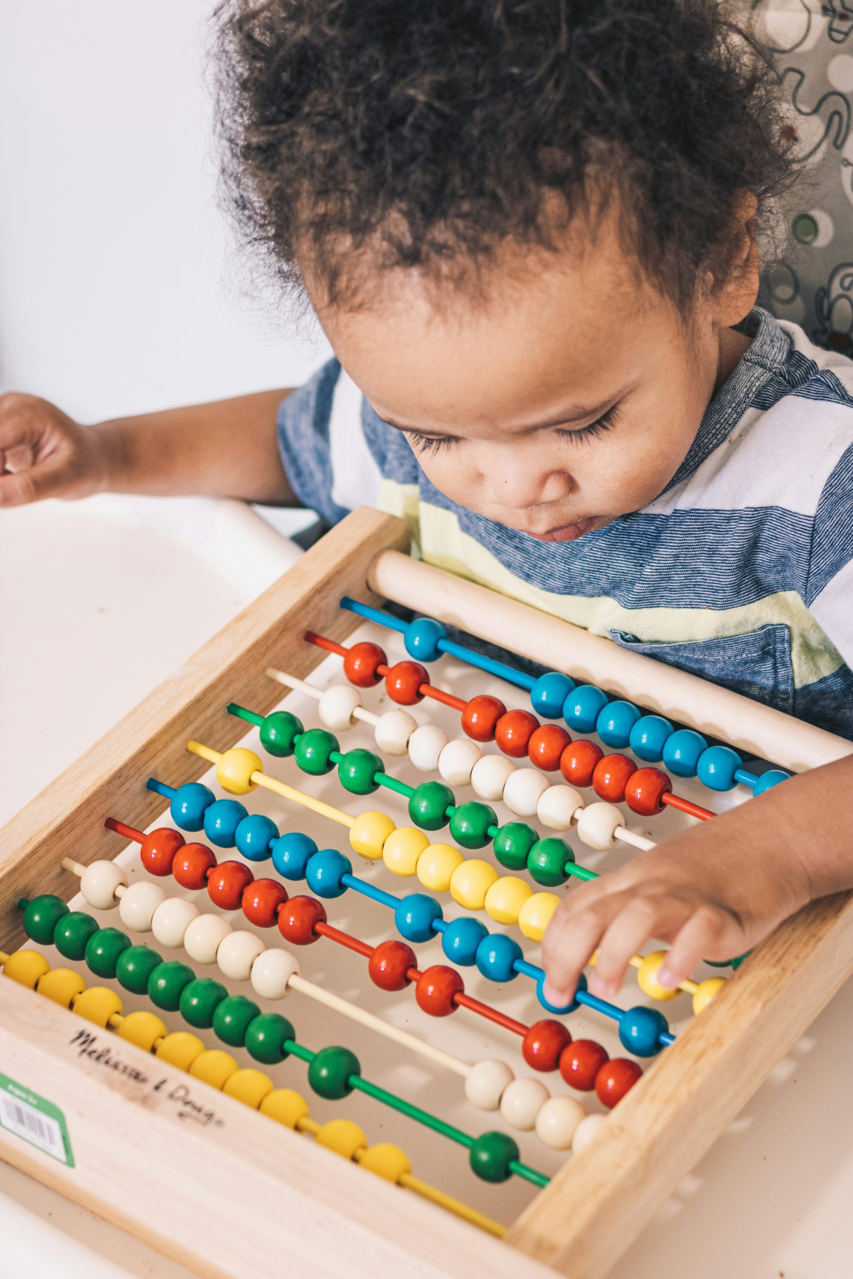 Young child engaged in a hands-on learning activity