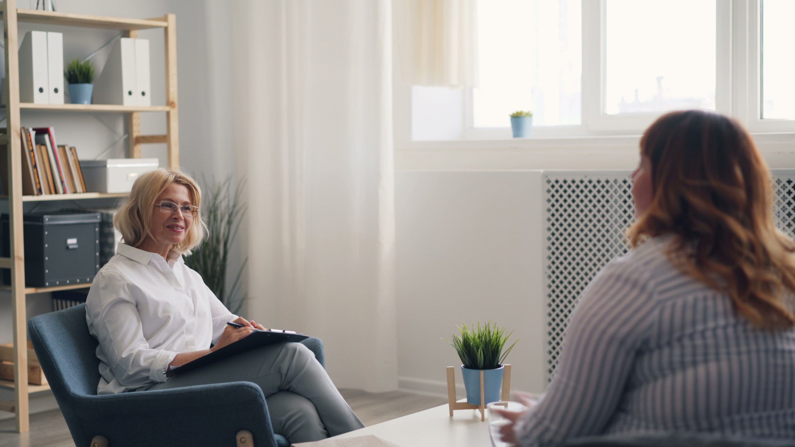Adult receiving cognitive-communication and rehabilitation support